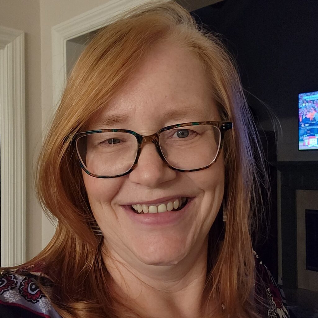 Headshot of Julie Beem, former Executive Director and long-time leader at the Attachment and Trauma Network (ATN).